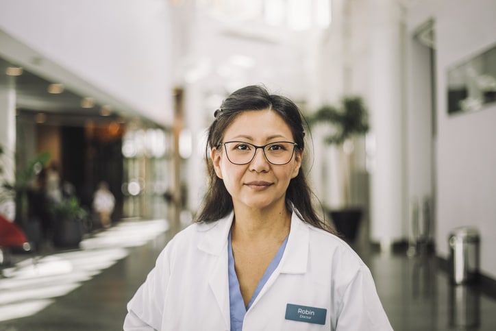 Health Care Professional standing in modern clinic