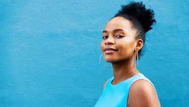 Portrait of woman with blue background Portrait of woman with blue background